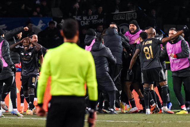 Qarabag's players celebrate a goal during the UEFA Champions League league phase football match between Qarabag and Frankfurt at the Tofiq Bahramov Republican Stadium in Baku on January 21, 2026. (Photo by Tofik BABAYEV / AFP)