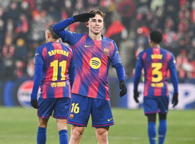 Barcelona's Spanish midfielder #16 Fermin Lopez celebrates after scoring during in the UEFA Champions League football match between Slavia Prague (CZE) and FC Barcelona (ESP) in Prague, Czech Republic on January  21, 2026. (Photo by Michal Cizek / AFP)