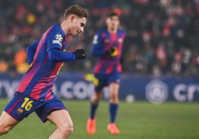 Barcelona's Spanish midfielder #16 Fermin Lopez celebrates after scoring during in the UEFA Champions League football match between Slavia Prague (CZE) and FC Barcelona (ESP) in Prague, Czech Republic on January  21, 2026. (Photo by Michal Cizek / AFP)