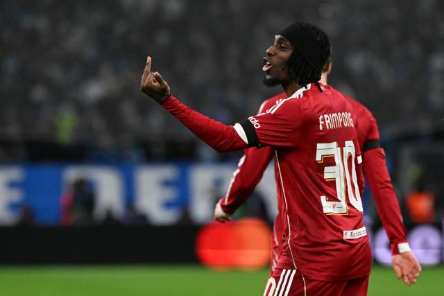 Liverpool's Dutch defender #30 Jeremie Frimpong gestures after Liverpool's 2-0 goal during the UEFA Champions League, league phase day 7, football match between Olympique de Marseille (OM) and Liverpool FC at the Stade Velodrome in Marseille, southern France, on January 21, 2026. (Photo by Miguel MEDINA / AFP)