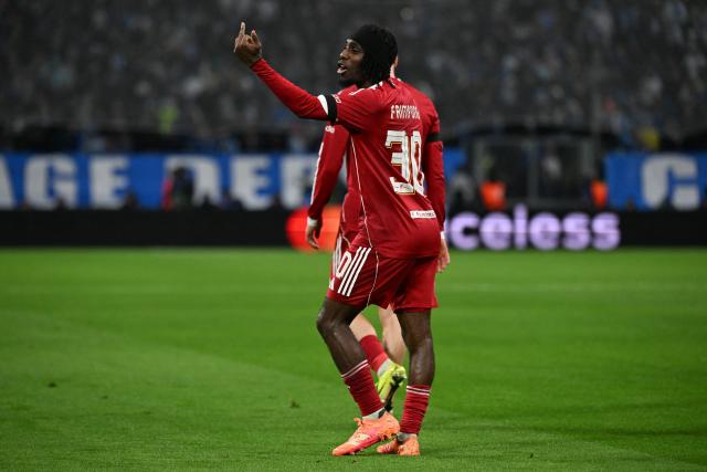 Liverpool's Dutch defender #30 Jeremie Frimpong gestures after Liverpool's 2-0 goal during the UEFA Champions League, league phase day 7, football match between Olympique de Marseille (OM) and Liverpool FC at the Stade Velodrome in Marseille, southern France, on January 21, 2026. (Photo by Miguel MEDINA / AFP)