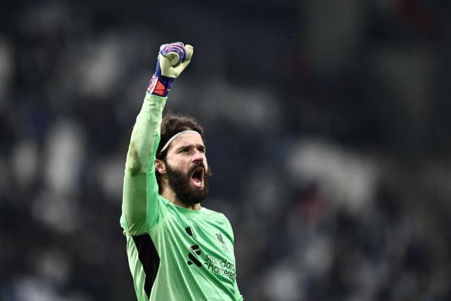 Liverpool's Brazilian goalkeeper #01 Alisson celebrates at the end of the UEFA Champions League, league phase day 7, football match between Olympique de Marseille (OM) and Liverpool FC at the Stade Velodrome in Marseille, southern France, on January 21, 2026. (Photo by Thibaud MORITZ / AFP)