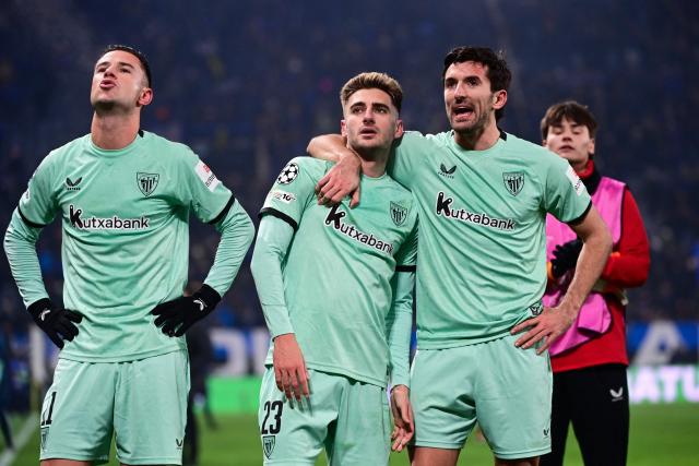 (From L) Athletic Bilbao's Spanish forward #11 Gorka Guruzeta, Athletic Bilbao's Spanish forward #23 Roberto Navarro and Athletic Bilbao's Spanish defender #03 Dani Vivian celebrate at the end of the UEFA Champions League, league phase day 7, football match between Atalanta Bergame and Athletic Bilbao at the stadio Atleti Azzurri d'Italia stadium in Bergamo on January 21, 2026. (Photo by PIERO CRUCIATTI / AFP)