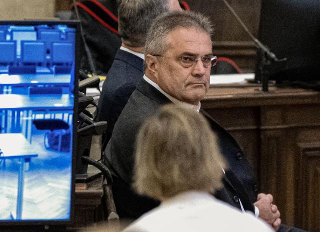 (FILES) Austrian former intelligence official Egisto Ott sits in the courtroom at the start of his trial in the criminal court in Vienna, Austria, on November 6, 2024, for allegedly violating official secrecy, the first charges in a closely watched case involving Russia spying accusations. Ott, 63, allegedly made mutual legal assistance requests to Italy and the UK, causing them to act unknowingly in Moscow’s interest, prosecutors said, adding that he also used European databases. (Photo by JOE KLAMAR / AFP)