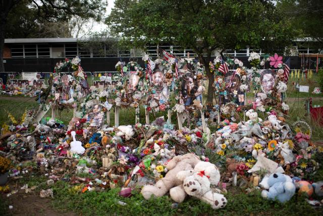 (FILES) Crosses set up to honor those who lost their lives during the Robb Elementary School shooting are seen in Uvalde, Texas on November 8, 2022. A US jury on January 21, 2026 acquitted the former school police officer for his response to a 2022 mass shooting at a Texas elementary school which killed 21 people, including 19 children -- the the frustration of the victims's families. (Photo by Mark Felix / AFP)