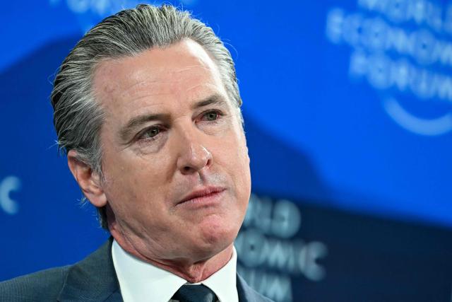 US Governor Of california Gavin Newsom looks on during the World Economic Forum (WEF) annual meeting in Davos on January 22, 2026. The World Economic Forum takes place in Davos from January 19 to January 23, 2026. (Photo by Fabrice COFFRINI / AFP)