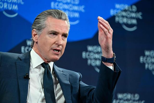 US Governor Of california Gavin Newsom gestures as he speaks during the World Economic Forum (WEF) annual meeting in Davos on January 22, 2026. The World Economic Forum takes place in Davos from January 19 to January 23, 2026. (Photo by Fabrice COFFRINI / AFP)