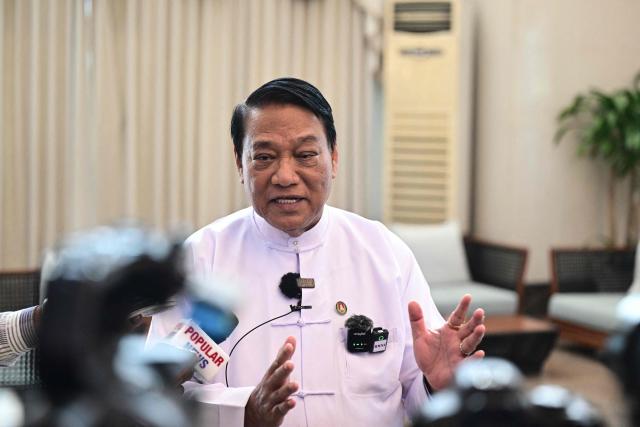The Union Solidarity and Development Party (USDP) chairman U Khin Yi speak to journalists after a ceremony to sign a cooperation agreement with Belarusian political party Belaya Rus at the Sky Star Hotel in Yangon on January 22, 2026. (Photo by AFP)