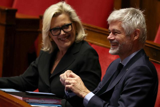Droite Republicaine's MP Michele Tabarot (L) and President of Droite Republicaine parliamentary group Laurent Wauquiez attend a debate on the examination of draft legislation proposed by Les Républicains (LR) group, which sets the agenda  during their parliamentary niche at the National Assembly in Paris, on January 22, 2026. (Photo by Thomas SAMSON / AFP)