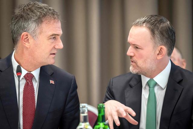 Britain's Business Secretary Peter Kyle (L) speaks with US Trade Representative Jamieson Greer during a World Trade Organization (WTO) Informal ministerial gathering on the sidelines of the World Economic Forum (WEF) annual meeting in Davos on January 22, 2026. The World Economic Forum takes place in Davos from January 19 to January 23, 2026. (Photo by LAURENT GILLIERON / POOL / AFP)