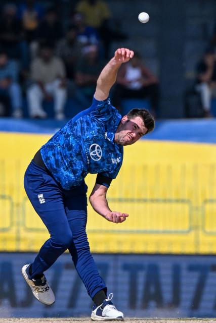 England's Jamie Overton bowls during the first one-day international (ODI) cricket match between Sri Lanka and England at the R. Premadasa International Cricket Stadium in Colombo on January 22, 2026. (Photo by Ishara S. KODIKARA / AFP)