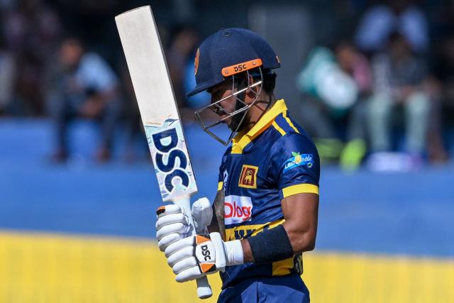 Sri Lanka's Pathum Nissanka walks back to the pavilion after his dismissal during the first one-day international (ODI) cricket match between Sri Lanka and England at the R. Premadasa International Cricket Stadium in Colombo on January 22, 2026. (Photo by Ishara S. KODIKARA / AFP)