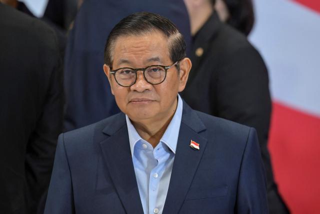 Governor of Jakarta Pramono Anung attends the original FIFA World Cup 2026 Trophy Tour in Jakarta on January 22, 2026. (Photo by BAY ISMOYO / AFP)