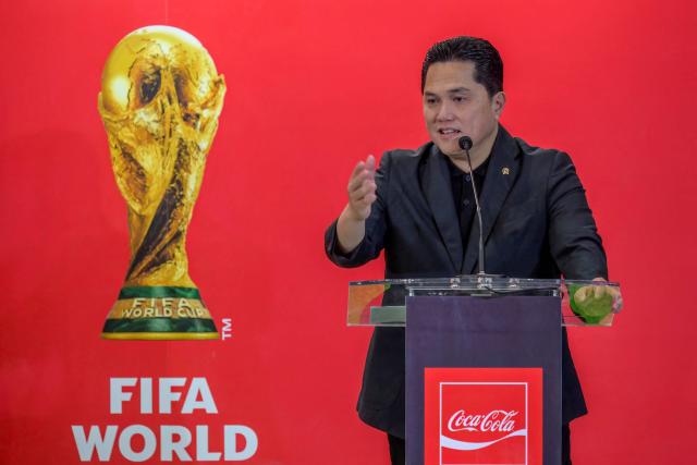Minister of Youth and Sports Erick Thohir delivers an opening speech while attending the original FIFA World Cup 2026 Trophy Tour in Jakarta on January 22, 2026. (Photo by BAY ISMOYO / AFP)