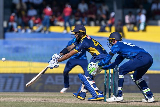 Sri Lanka's Kamil Mishara plays a shot during the first one-day international (ODI) cricket match between Sri Lanka and England at the R. Premadasa International Cricket Stadium in Colombo on January 22, 2026. (Photo by Ishara S. KODIKARA / AFP)