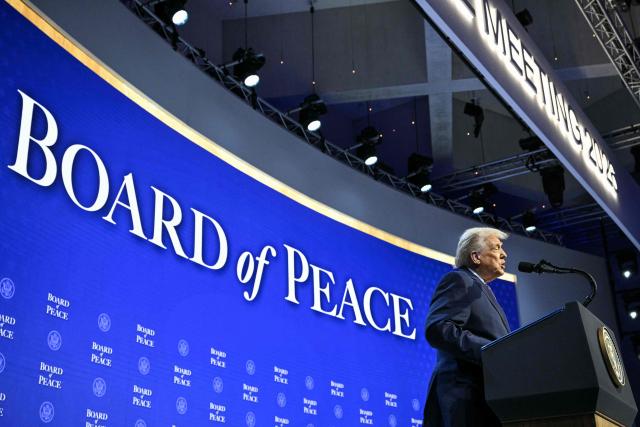 US President Donald Trump speaks at the "Board of Peace" meeting during the World Economic Forum (WEF) annual meeting in Davos on January 22, 2026. US President Donald Trump will show off his new "Board of Peace" at Davos on January 22, 2026 burnishing his claim to be a peacemaker a day after backing off his own threats against Greenland. Originally meant to oversee the rebuilding of Gaza after the war between Hamas and Israel, the board's charter does not limit its role to the Strip, and has sparked concerns that Trump wants it to rival the United Nations. (Photo by Mandel NGAN / AFP)
