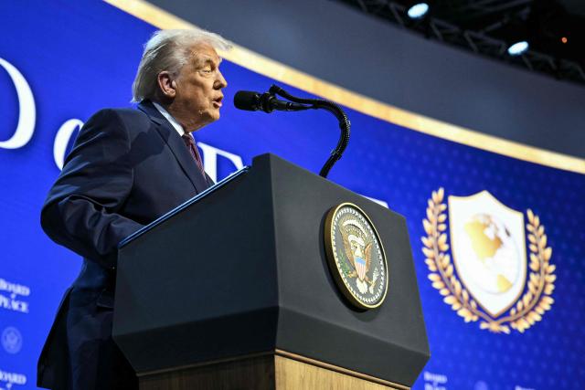 US President Donald Trump speaks at the "Board of Peace" meeting during the World Economic Forum (WEF) annual meeting in Davos on January 22, 2026. US President Donald Trump will show off his new "Board of Peace" at Davos on January 22, 2026 burnishing his claim to be a peacemaker a day after backing off his own threats against Greenland. Originally meant to oversee the rebuilding of Gaza after the war between Hamas and Israel, the board's charter does not limit its role to the Strip, and has sparked concerns that Trump wants it to rival the United Nations. (Photo by Mandel NGAN / AFP)