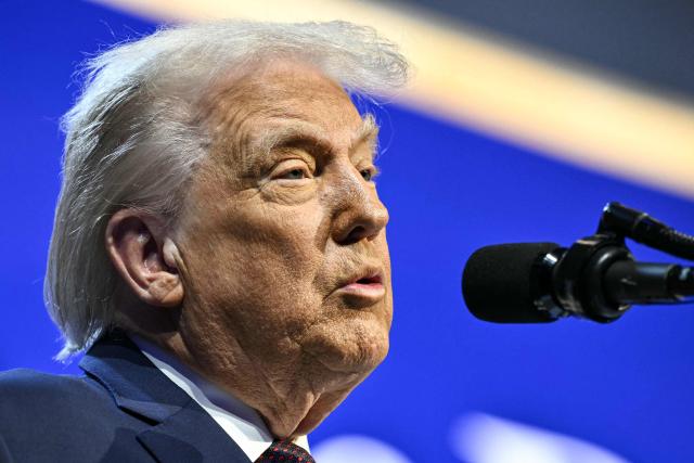 US President Donald Trump speaks at the "Board of Peace" meeting during the World Economic Forum (WEF) annual meeting in Davos on January 22, 2026. US President Donald Trump will show off his new "Board of Peace" at Davos on January 22, 2026 burnishing his claim to be a peacemaker a day after backing off his own threats against Greenland. Originally meant to oversee the rebuilding of Gaza after the war between Hamas and Israel, the board's charter does not limit its role to the Strip, and has sparked concerns that Trump wants it to rival the United Nations. (Photo by Mandel NGAN / AFP)