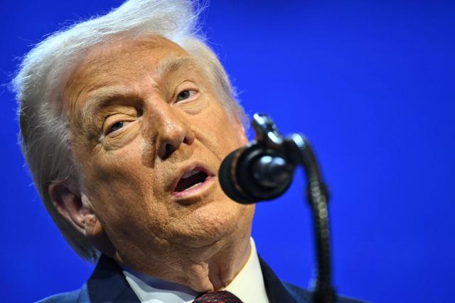 US President Donald Trump speaks at the "Board of Peace" meeting during the World Economic Forum (WEF) annual meeting in Davos on January 22, 2026. US President Donald Trump will show off his new "Board of Peace" at Davos on January 22, 2026 burnishing his claim to be a peacemaker a day after backing off his own threats against Greenland. Originally meant to oversee the rebuilding of Gaza after the war between Hamas and Israel, the board's charter does not limit its role to the Strip, and has sparked concerns that Trump wants it to rival the United Nations. (Photo by Mandel NGAN / AFP)