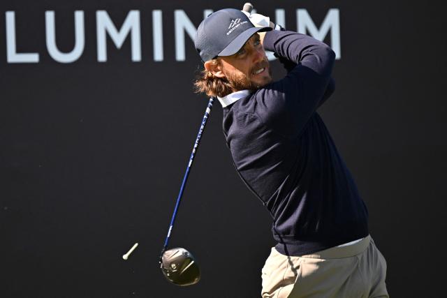 Tommy Fleetwood of England plays a shot on the 5th hole during the first day of the Hero Dubai Desert Classic golf tournament at the Emirates Golf Club in Dubai on January 22, 2026. (Photo by Giuseppe CACACE / AFP)