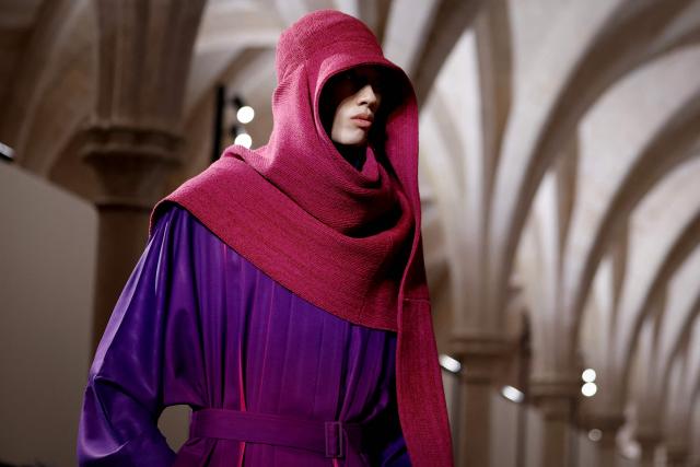 A model presents a creation by Issey Miyake for the Menswear Ready-to-wear Fall-Winter 2026/2027 collection as part of the Men Paris Fashion Week in Paris on January 22, 2026.  (Photo by Ian LANGSDON / AFP)