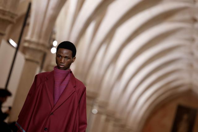 A model presents a creation by Issey Miyake for the Menswear Ready-to-wear Fall-Winter 2026/2027 collection as part of the Men Paris Fashion Week in Paris on January 22, 2026.  (Photo by Ian LANGSDON / AFP)