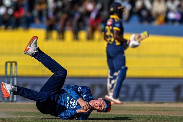 England's captain Harry Brook attempts to field the ball during the first one-day international (ODI) cricket match between Sri Lanka and England at the R. Premadasa International Cricket Stadium in Colombo on January 22, 2026. (Photo by Ishara S. KODIKARA / AFP)