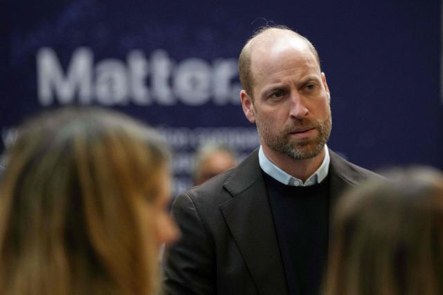 Britain's Prince William, Prince of Wales listens to employees as he pays a visit to the headquarters of Matter, a pioneer in sustainable technology, in the city of Bristol, south-west England, on January 22, 2026. (Photo by Alastair Grant / POOL / AFP)