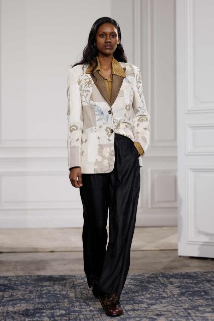 A model presents a creation by Kartik Research for the Menswear Ready-to-wear Fall-Winter 2026/2027 collection as part of the Men Paris Fashion Week in Paris on January 22, 2026.  (Photo by Ian LANGSDON / AFP)