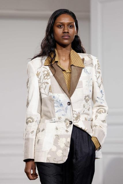 A model presents a creation by Kartik Research for the Menswear Ready-to-wear Fall-Winter 2026/2027 collection as part of the Men Paris Fashion Week in Paris on January 22, 2026.  (Photo by Ian LANGSDON / AFP)