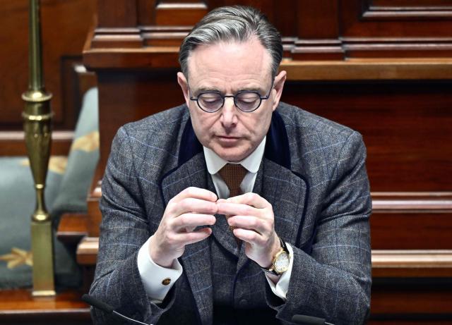 Belgium's Prime Minister Bart De Wever reacts during a plenary session of the Chamber at the federal parliament, in Brussels, on January 22, 2026. (Photo by ERIC LALMAND / Belga / AFP) / Belgium OUT