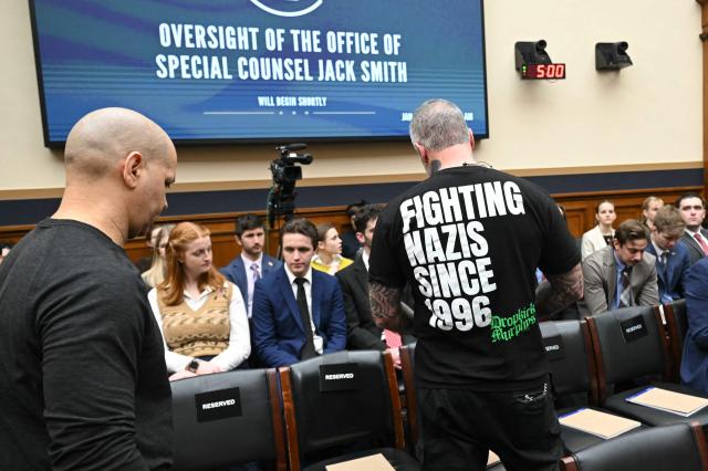 Former officer with the Metropolitan Police Department of the District of Columbia Michael Fanone (R) and Retired US Capitol Police officer Aquilino Gonel attend a hearing of Former US special counsel Jack Smith before the House Judiciary Committee about his investigations into President Donald Trump, in the Rayburn House Office Building on Capitol Hill in Washington, DC, on January 22, 2026. Former special counsel Jack Smith defended his prosecution of Donald Trump on Thursday, accusing him of engaging in a "criminal scheme" to overturn the results of the 2020 presidential election he lost to Democrat Joe Biden. (Photo by SAUL LOEB / AFP)