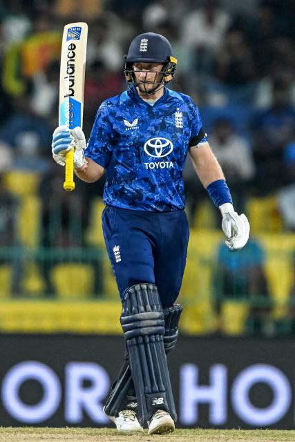 England's Joe Root celebrates after scoring a half-century (50 runs) during the first one-day international (ODI) cricket match between Sri Lanka and England at the R. Premadasa International Cricket Stadium in Colombo on January 22, 2026. (Photo by Ishara S. KODIKARA / AFP)