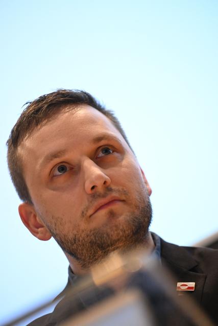 Greenland's Prime Minister Jens-Frederik Nielsen addresses a press conference on January 22, 2026 in Greenland's capital Nuuk. (Photo by Jonathan Nackstrand / AFP)