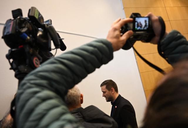 Greenland's Prime Minister Jens-Frederik Nielsen addresses a press conference on January 22, 2026 in Greenland's capital Nuuk. (Photo by Jonathan Nackstrand / AFP)