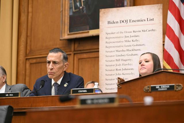 US Representative Darrell Issa (L), Republican from California looks on as Former US special counsel Jack Smith testifies before the House Judiciary Committee about his investigations into President Donald Trump, in the Rayburn House Office Building on Capitol Hill in Washington, DC, on January 22, 2026. Former special counsel Jack Smith defended his prosecution of Donald Trump on Thursday, accusing him of engaging in a "criminal scheme" to overturn the results of the 2020 presidential election he lost to Democrat Joe Biden. (Photo by SAUL LOEB / AFP)