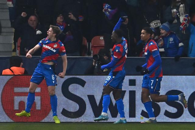 Viktoria Plzen's Czech midfielder #06 Lukas Cerv celebrates with his team mates after scoring his team's first goal during the UEFA Europa League first round - day 7 football match between FC Viktoria Plzen and FC Porto in Plzen, Czech Republic on January 22, 2026. (Photo by Michal Cizek / AFP)