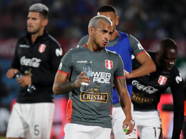 (FILES) Peru's Miguel Trauco is seen before the South American qualification football match for the FIFA World Cup Qatar 2022 against Uruguay at the Centenario Stadium in Montevideo on March 24, 2022. Alianza Lima, one of Peru's most popular teams, suspended three players and former national team members indefinitely on January 22, 2025, after they were accused of raping a young Argentine woman in Montevideo, the club said. (Photo by Raul MARTINEZ / AFP)