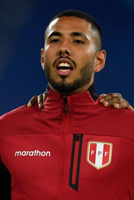 (FILES) Peru's Sergio Pena sings the national anthem before the Conmebol Copa America 2021 football tournament group phase match against Brazil at the Nilton Santos Stadium in Rio de Janeiro, Brazil, on June 17, 2021. Alianza Lima, one of Peru's most popular teams, suspended three players and former national team members indefinitely on January 22, 2025, after they were accused of raping a young Argentine woman in Montevideo, the club said. (Photo by Mauro PIMENTEL / AFP)