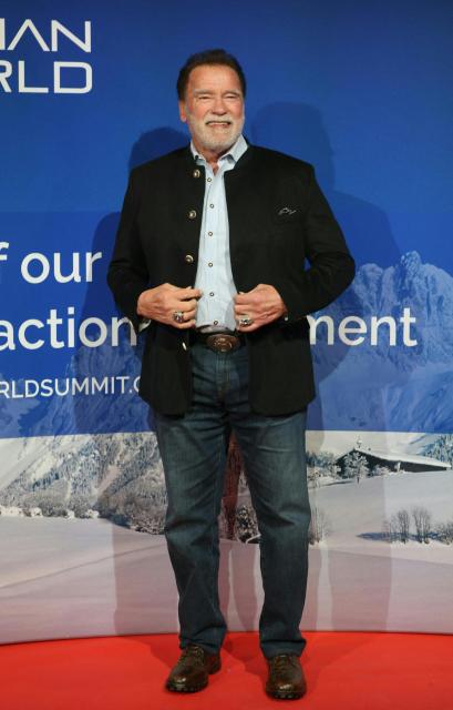 US-Austrian actor Arnold Schwarzenegger poses for a photo during the charity auction "Special Dinner for Climate Action" in Going, Austria on January 22, 2026. (Photo by Johann GRODER / various sources / AFP) / Austria OUT