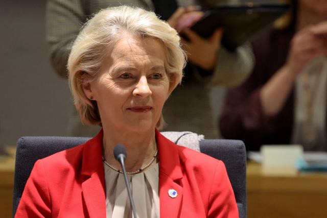 European Commission President Ursula von der Leyen sits as she arrives to attend a roundtable meeting of the European Council to discuss recent developments in transatlantic relations, at the European headquarters in Brussels, on January 22, 2026. EU leaders meet on January 22, 2026, for an emergency summit on threats by US President to impose tariffs on countries opposed to his push to take Greenland, with crisis talks in Brussels coming to weigh potential countermeasures against the United States. (Photo by Ludovic MARIN / AFP)