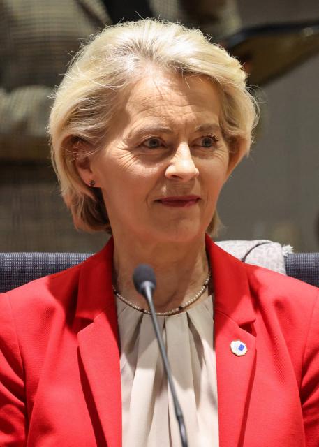 European Commission President Ursula von der Leyen sits as she arrives to attend a roundtable meeting of the European Council to discuss recent developments in transatlantic relations, at the European headquarters in Brussels, on January 22, 2026. EU leaders meet on January 22, 2026, for an emergency summit on threats by US President to impose tariffs on countries opposed to his push to take Greenland, with crisis talks in Brussels coming to weigh potential countermeasures against the United States. (Photo by Ludovic MARIN / AFP)