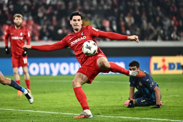 Freiburg's German forward #31 Igor Matanovic shoots but misses to score during the UEFA Europa League first round - day 7 football match between SC Freiburg and Maccabi Tel Aviv in Freiburg, southwestern Germany, on January 22, 2026. (Photo by Silas STEIN / AFP)