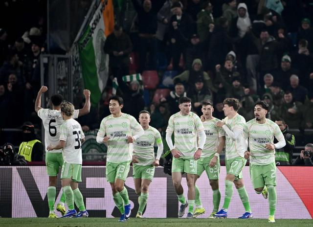 Celtic's US defender #06 Auston Trusty (L) celebrates scoring his team's second goal during the Europa League 1st round day 7 football match between Bologna and Celtic at Stadio Renato Dall'Ara in Bologna on January 22, 2026. (Photo by Isabella BONOTTO / AFP)