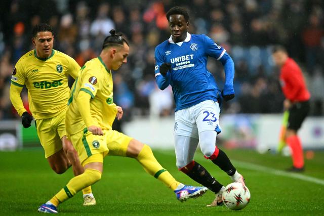 Rangers' French forward #23 Djeidi Gassama passes the ball during the UEFA Europa League, league-stage football match between Rangers and Ludogorets Razgrad at the Ibrox Stadium in Glasgow on January 22, 2026. (Photo by ANDY BUCHANAN / AFP)