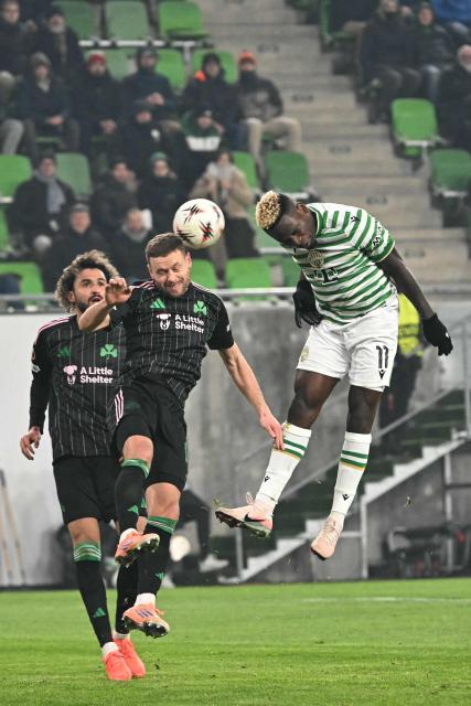 Panathinaikos' Icelandic defender #15 Sverrir Ingason and Ferencvaros' Nigerian forward #11 Bamidele Yusuf vie for the ball during the UEFA Europa League football match 1st round- Day 7 between Ferencvarosi TC and Panathinaikos in Budapest, Hungary on January 22, 2026. (Photo by Attila KISBENEDEK / AFP)