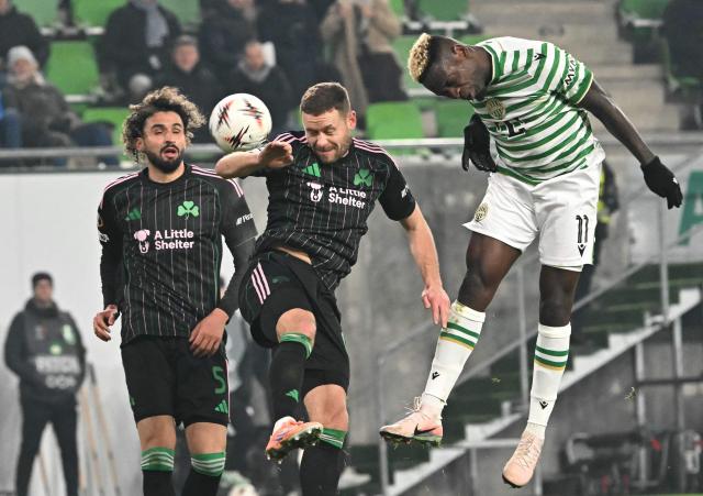 Panathinaikos' Algerian defender #05 Ahmed Touba, Panathinaikos' Icelandic defender #15 Sverrir Ingason and Ferencvaros' Nigerian forward #11 Bamidele Yusuf vie for the ball during the UEFA Europa League football match 1st round- Day 7 between Ferencvarosi TC and Panathinaikos in Budapest, Hungary on January 22, 2026. (Photo by Attila KISBENEDEK / AFP)