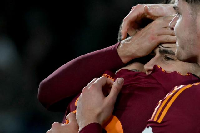 Roma's Italian midfielder #61 Niccolo Pisilli (2nd R) celebrates scoring his team's first goal during the Europa League 1st round day 7 football match between AS Roma and VfB Stuttgart at Stadio Olimpico in Rome on January 22, 2026. (Photo by Filippo MONTEFORTE / AFP)