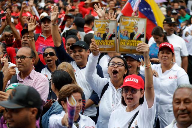 Supporters of ousted Venezuelan President Nicolas Maduro, including health sector workers, take part in a demonstration to the UN headquarters in Caracas to demand his release, on January 22, 2026. (Photo by Pedro MATTEY / AFP)