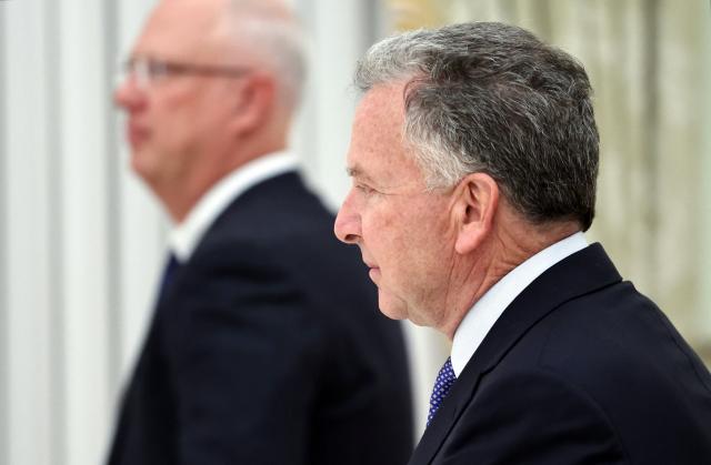 In this pool photograph distributed by the Russian state agency Sputnik, US special envoy Steve Witkoff and Kremlin economic envoy Kirill Dmitriev attend a meeting with Russia's President at the Kremlin in Moscow on January 22, 2026. (Photo by Alexander KAZAKOV / POOL / AFP)